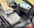 Черный Опель Астра, объемом двигателя 1.4 л и пробегом 176 тыс. км за 4390 $, фото 7 на Automoto.ua