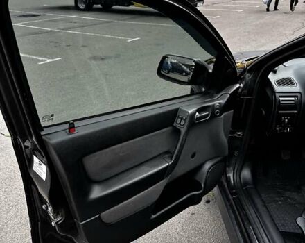 Черный Опель Астра, объемом двигателя 1.4 л и пробегом 277 тыс. км за 3300 $, фото 11 на Automoto.ua