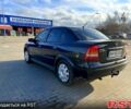 Черный Опель Астра, объемом двигателя 1.4 л и пробегом 176 тыс. км за 4000 $, фото 1 на Automoto.ua