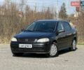 Черный Опель Астра, объемом двигателя 1.4 л и пробегом 159 тыс. км за 3999 $, фото 1 на Automoto.ua
