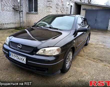 Черный Опель Астра, объемом двигателя 1.4 л и пробегом 250 тыс. км за 3999 $, фото 6 на Automoto.ua