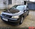 Черный Опель Астра, объемом двигателя 1.4 л и пробегом 250 тыс. км за 3999 $, фото 6 на Automoto.ua