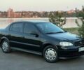 Черный Опель Астра, объемом двигателя 1.6 л и пробегом 228 тыс. км за 4200 $, фото 1 на Automoto.ua