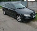 Черный Опель Астра, объемом двигателя 1.39 л и пробегом 166 тыс. км за 4600 $, фото 1 на Automoto.ua