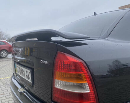 Черный Опель Астра, объемом двигателя 1.4 л и пробегом 229 тыс. км за 3200 $, фото 9 на Automoto.ua