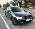 Черный Опель Астра, объемом двигателя 1.4 л и пробегом 278 тыс. км за 2699 $, фото 1 на Automoto.ua