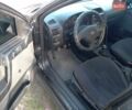 Чорний Опель Астра, об'ємом двигуна 1.4 л та пробігом 270 тис. км за 3100 $, фото 6 на Automoto.ua