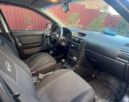 Черный Опель Астра, объемом двигателя 1.6 л и пробегом 151 тыс. км за 3700 $, фото 7 на Automoto.ua