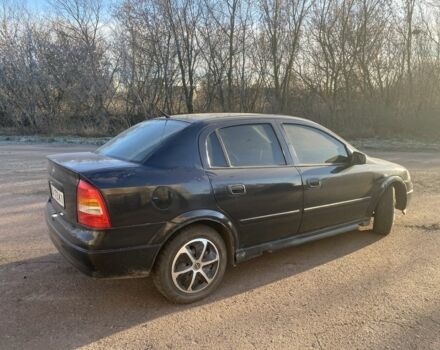 Черный Опель Астра, объемом двигателя 1.4 л и пробегом 219 тыс. км за 3400 $, фото 4 на Automoto.ua