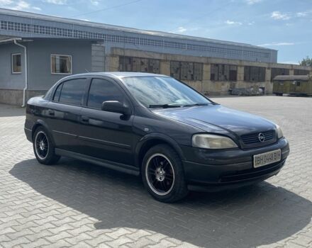 Черный Опель Астра, объемом двигателя 1.4 л и пробегом 400 тыс. км за 2650 $, фото 2 на Automoto.ua