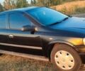 Черный Опель Астра, объемом двигателя 1.4 л и пробегом 281 тыс. км за 2500 $, фото 9 на Automoto.ua