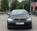 Черный Опель Астра, объемом двигателя 1.4 л и пробегом 277 тыс. км за 3300 $, фото 5 на Automoto.ua