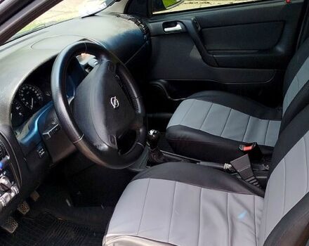 Черный Опель Астра, объемом двигателя 1.6 л и пробегом 217 тыс. км за 4100 $, фото 9 на Automoto.ua