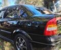 Черный Опель Астра, объемом двигателя 1.4 л и пробегом 272 тыс. км за 3300 $, фото 4 на Automoto.ua