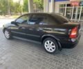 Черный Опель Астра, объемом двигателя 1.4 л и пробегом 107 тыс. км за 4800 $, фото 9 на Automoto.ua