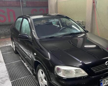 Черный Опель Астра, объемом двигателя 1.4 л и пробегом 338 тыс. км за 2300 $, фото 12 на Automoto.ua