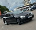 Черный Опель Астра, объемом двигателя 1.4 л и пробегом 272 тыс. км за 3200 $, фото 1 на Automoto.ua