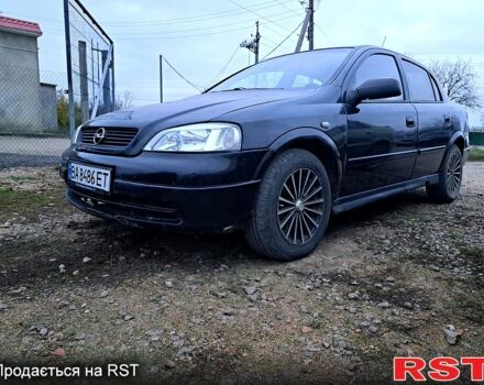 Черный Опель Астра, объемом двигателя 1.4 л и пробегом 256 тыс. км за 2150 $, фото 2 на Automoto.ua