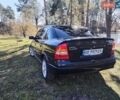 Черный Опель Астра, объемом двигателя 1.6 л и пробегом 270 тыс. км за 3000 $, фото 1 на Automoto.ua