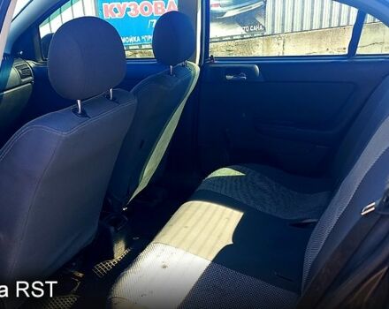 Черный Опель Астра, объемом двигателя 1.4 л и пробегом 290 тыс. км за 4300 $, фото 3 на Automoto.ua