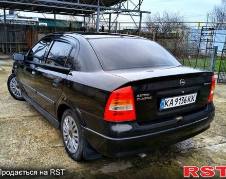 Черный Опель Астра, объемом двигателя 1.4 л и пробегом 250 тыс. км за 3999 $, фото 5 на Automoto.ua