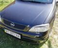 Черный Опель Астра, объемом двигателя 1.4 л и пробегом 272 тыс. км за 3300 $, фото 1 на Automoto.ua