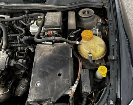 Черный Опель Астра, объемом двигателя 1.4 л и пробегом 277 тыс. км за 3300 $, фото 18 на Automoto.ua