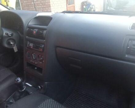 Черный Опель Астра, объемом двигателя 1.4 л и пробегом 129 тыс. км за 3700 $, фото 2 на Automoto.ua