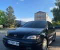 Черный Опель Астра, объемом двигателя 1.6 л и пробегом 260 тыс. км за 3200 $, фото 1 на Automoto.ua