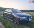 Черный Опель Астра, объемом двигателя 1.4 л и пробегом 140 тыс. км за 3300 $, фото 1 на Automoto.ua