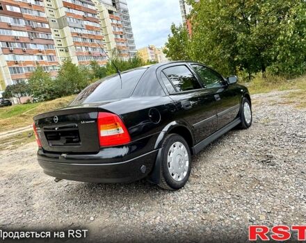 Черный Опель Астра, объемом двигателя 1.4 л и пробегом 176 тыс. км за 4390 $, фото 4 на Automoto.ua