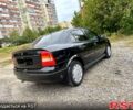 Черный Опель Астра, объемом двигателя 1.4 л и пробегом 176 тыс. км за 4390 $, фото 4 на Automoto.ua