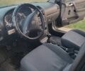 Черный Опель Астра, объемом двигателя 1.4 л и пробегом 140 тыс. км за 3300 $, фото 6 на Automoto.ua