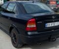 Черный Опель Астра, объемом двигателя 1.4 л и пробегом 270 тыс. км за 3000 $, фото 2 на Automoto.ua