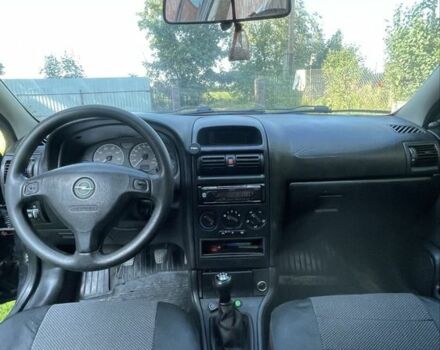 Черный Опель Астра, объемом двигателя 1.4 л и пробегом 278 тыс. км за 2699 $, фото 8 на Automoto.ua