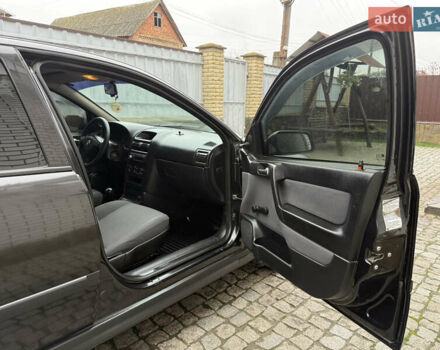 Чорний Опель Астра, об'ємом двигуна 1.4 л та пробігом 160 тис. км за 4000 $, фото 25 на Automoto.ua