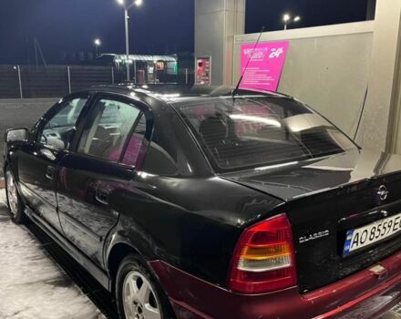 Черный Опель Астра, объемом двигателя 1.4 л и пробегом 338 тыс. км за 2300 $, фото 3 на Automoto.ua