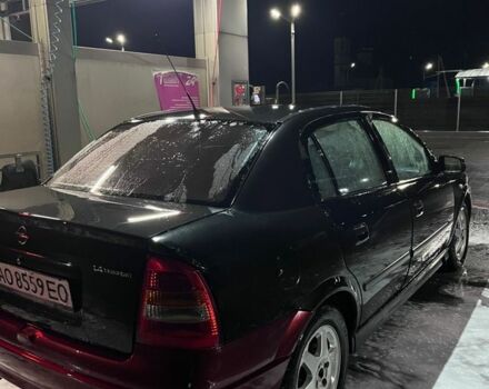 Черный Опель Астра, объемом двигателя 1.4 л и пробегом 338 тыс. км за 2300 $, фото 10 на Automoto.ua