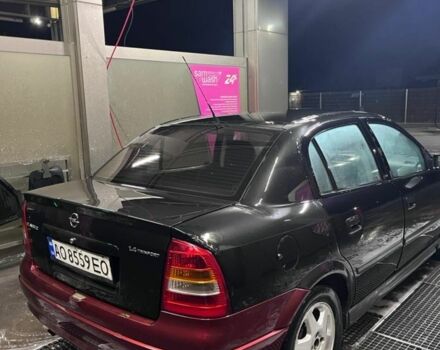 Черный Опель Астра, объемом двигателя 1.4 л и пробегом 338 тыс. км за 2300 $, фото 4 на Automoto.ua