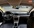 Черный Опель Астра, объемом двигателя 1.6 л и пробегом 141 тыс. км за 5800 $, фото 13 на Automoto.ua