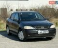 Черный Опель Астра, объемом двигателя 1.4 л и пробегом 159 тыс. км за 4300 $, фото 1 на Automoto.ua
