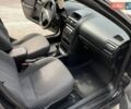 Черный Опель Астра, объемом двигателя 1.4 л и пробегом 270 тыс. км за 3000 $, фото 11 на Automoto.ua