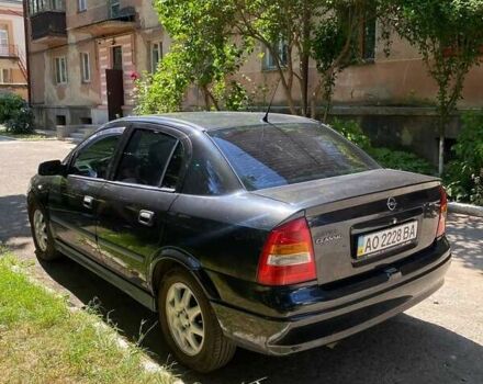 Черный Опель Астра, объемом двигателя 1.67 л и пробегом 169 тыс. км за 3800 $, фото 4 на Automoto.ua