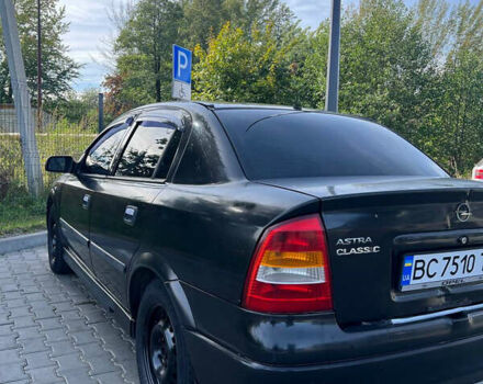 Черный Опель Астра, объемом двигателя 1.4 л и пробегом 290 тыс. км за 2700 $, фото 11 на Automoto.ua