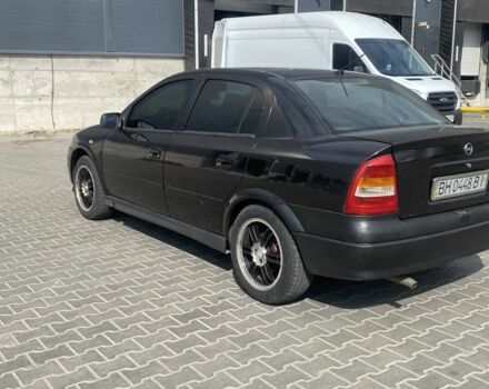 Черный Опель Астра, объемом двигателя 1.4 л и пробегом 400 тыс. км за 2650 $, фото 6 на Automoto.ua
