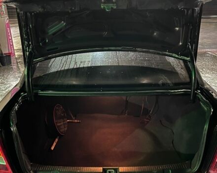 Черный Опель Астра, объемом двигателя 1.4 л и пробегом 338 тыс. км за 2300 $, фото 6 на Automoto.ua