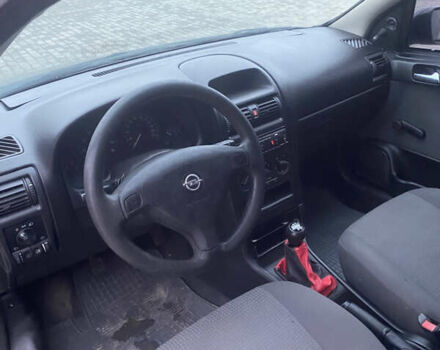 Черный Опель Астра, объемом двигателя 1.4 л и пробегом 229 тыс. км за 3200 $, фото 11 на Automoto.ua
