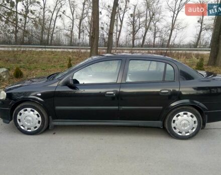 Черный Опель Астра, объемом двигателя 1.6 л и пробегом 198 тыс. км за 4100 $, фото 6 на Automoto.ua