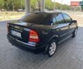 Черный Опель Астра, объемом двигателя 1.4 л и пробегом 107 тыс. км за 4800 $, фото 6 на Automoto.ua