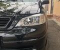 Черный Опель Астра, объемом двигателя 1.4 л и пробегом 180 тыс. км за 4500 $, фото 1 на Automoto.ua